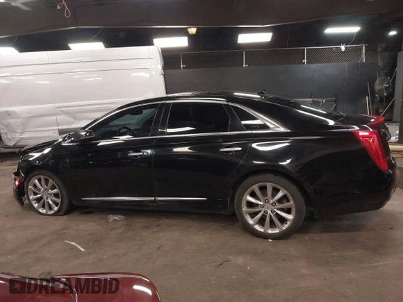 2013 Cadillac XTS Luxury z VIN 2G61R5S34D9102625, wystawiony jako IAAI lot #41668752 z przebiegiem 112 065 mil mil oraz . Historia ofert i sprzedaży dostępna na DreamBid. Obrazek 14.
