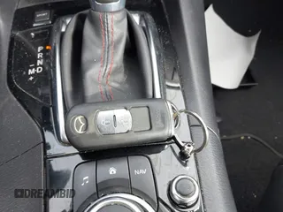 2014 Mazda 3 s Touring with VIN JM1BM1L35E1208952, listed as a IAAI auction lot 42121077 with 183,985 mi miles. Bid and sale history available at carsss.com. Image 11.