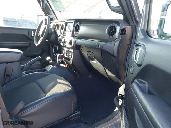 2023 Jeep Gladiator Freedom with VIN 1C6HJTAG9PL517097, listed as a IAAI auction lot 41860666 with 24,478 mi miles. Bid and sale history available at carsss.com. Image 5.