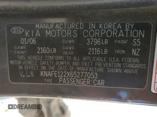 2006 Kia Spectra EX with VIN KNAFE122X65277053, listed as a Copart auction lot 75697314 with 147,156 mi miles and Salvage Title. Bid and sale history available at carsss.com. Image 14.