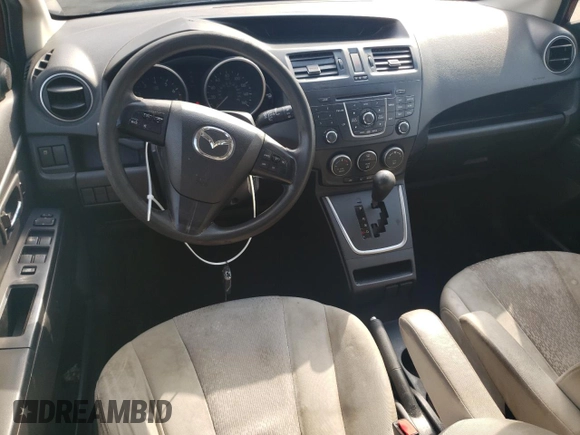 2012 Mazda 5 Sport with VIN JM1CW2BL1C0122823, listed as a Copart auction lot 74294754 with 172,299 mi miles and Salvage Title. Bid and sale history available at DreamBid. Image 8.