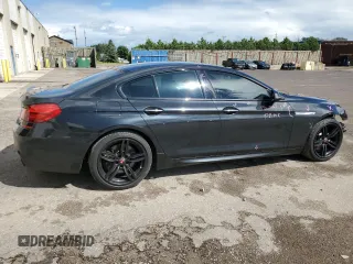2017 BMW 6 Series z VIN WBA6D2C31HGT73273, wystawiony jako Copart lot #67705734 z przebiegiem 75 080 mil mil oraz Szkoda całkowita • Salvage title. Historia ofert i sprzedaży dostępna na DreamBid. Obrazek 3.