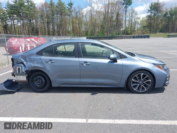 2021 Toyota Corolla SE with VIN JTDS4MCE0MJ077656, listed as a IAAI auction lot 42162598 with 32,714 mi miles and . Bid and sale history available at carsss.com. Image 13.