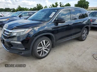 2017 Honda Pilot Touring with VIN 5FNYF6H99HB018503, listed as a Copart auction lot 63087025 with 369,312 mi miles and Clean title. Bid and sale history available at DreamBid. Image 1.