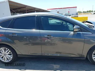 2018 Ford Focus Titanium with VIN 1FADP3N28JL232120, listed as a IAAI auction lot 42544070 with 28,661 mi miles and . Bid and sale history available at DreamBid. Image 14.