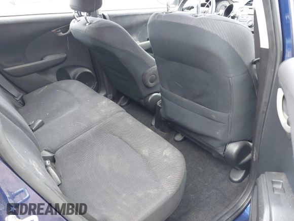 2012 Honda Fit Sport with VIN JHMGE8H50CC001195, listed as a IAAI auction lot 42083901 with 149,303 mi miles and . Bid and sale history available at DreamBid. Image 8.