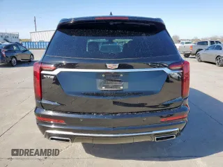 2020 Cadillac XT6 FWD Premium Luxury z VIN 1GYKPCRS7LZ131298, wystawiony jako Copart lot #50196605 z przebiegiem 63 320 mil mil oraz Czysty tytuł • Clean title. Historia ofert i sprzedaży dostępna na DreamBid. Obrazek 6.