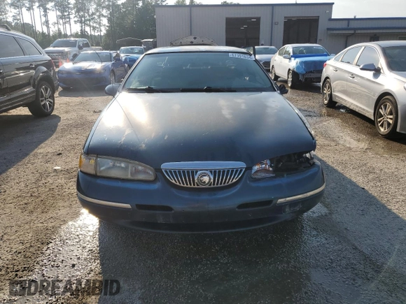 1996 Mercury Cougar z VIN 1MELM62W6TH629420, wystawiony jako Copart lot #67101634 z przebiegiem 71 996 mil mil oraz Szkody całkowita. Historia ofert i sprzedaży dostępna na DreamBid. Obrazek 5.