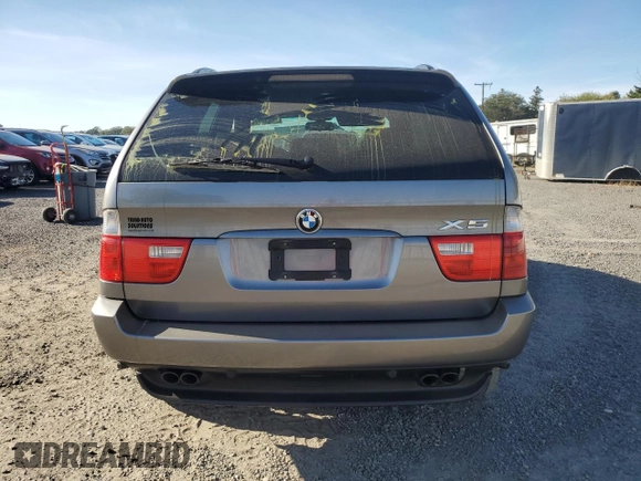 2005 BMW X5 4.4i with VIN 5UXFB53565LV15453, listed as a Copart auction lot 75830774 with 148,211 mi miles and Salvage Title. Bid and sale history available at carsss.com. Image 6.