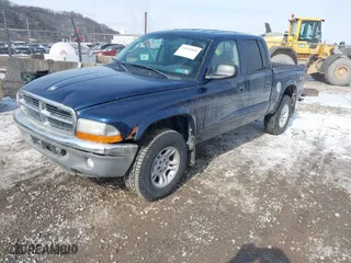 2004 Dodge Dakota SLT with VIN 1D7HG48N24S680151, listed as a IAAI auction lot 41620040 with 96,447 mi miles. Bid and sale history available at carsss.com. Image 2.
