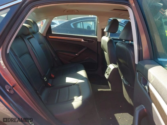 2017 Volkswagen Passat 1.8T SE w/Technology with VIN 1VWGT7A39HC066335, listed as a IAAI auction lot 41057523 with 106,771 mi miles. Bid and sale history available at carsss.com. Image 8.