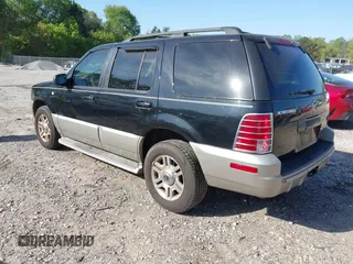 2003 Mercury Mountaineer Convenience z VIN 4M2DU66W13ZJ05239, wystawiony jako IAAI lot #42062881 z przebiegiem 292 631 mil mil oraz . Historia ofert i sprzedaży dostępna na DreamBid. Obrazek 3.