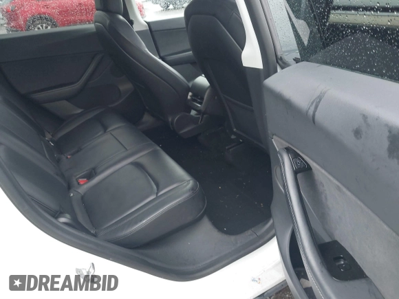 2021 Tesla Model Y Standard Range with VIN 5YJYGDED3MF103499, listed as a IAAI auction lot 41632064 with 132,846 mi miles and . Bid and sale history available at DreamBid. Image 8.