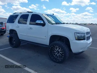 2007 Chevrolet Tahoe LT z VIN 1GNFK13077R295052, wystawiony jako IAAI lot #42245109 z przebiegiem 163 046 mil mil oraz . Historia ofert i sprzedaży dostępna na DreamBid. Obrazek 1.