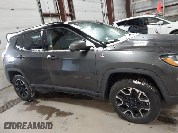 2019 Jeep Compass Trailhawk with VIN 3C4NJDDB2KT649889, listed as a IAAI auction lot 41562599 with 70,700 mi miles and . Bid and sale history available at carsss.com. Image 13.