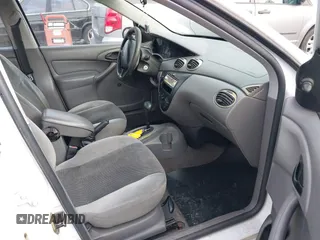2003 Ford Focus LX with VIN 1FAFP33P73W156382, listed as a IAAI auction lot 41591885 with 174,169 mi miles and . Bid and sale history available at carsss.com. Image 5.