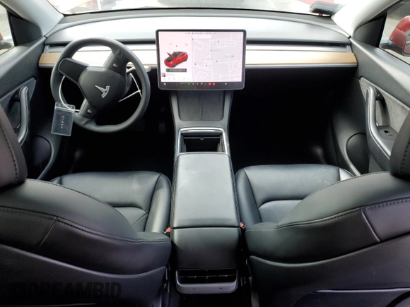2021 Tesla Model Y Long Range with VIN 5YJYGDEEXMF217816, listed as a Copart auction lot 51008665 with 57,392 mi miles and Salvage Title. Bid and sale history available at DreamBid. Image 8.