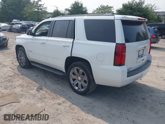 2017 Chevrolet Tahoe LT z VIN 1GNSKBKC2HR330422, wystawiony jako IAAI lot #42419205 z przebiegiem 136 444 mil mil oraz . Historia ofert i sprzedaży dostępna na DreamBid. Obrazek 3.