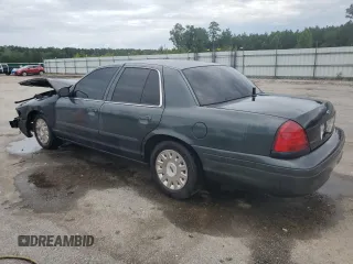 2003 Ford Police Interceptor Street Appear z VIN 2FAFP71WX3X104802, wystawiony jako Copart lot #60667985 z przebiegiem 189 373 mil mil oraz Szkoda całkowita • Salvage title. Historia ofert i sprzedaży dostępna na DreamBid. Obrazek 2.