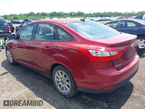 2013 Ford Focus SE z VIN 1FADP3F26DL242146, wystawiony jako IAAI lot #42679877 z przebiegiem 207 908 mil mil oraz . Historia ofert i sprzedaży dostępna na DreamBid. Obrazek 3.