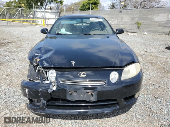 1997 Lexus SC 400 z VIN JT8CH32Y6V1000062, wystawiony jako Copart lot #51287595 z przebiegiem 243 624 mil mil oraz Szkody całkowita. Historia ofert i sprzedaży dostępna na DreamBid. Obrazek 5.