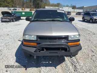 2004 Chevrolet Blazer LS z VIN 1GNDT13X54K166622, wystawiony jako Copart lot #50248605 z przebiegiem 198 301 mil mil oraz Szkoda całkowita • Salvage title. Historia ofert i sprzedaży dostępna na DreamBid. Obrazek 5.