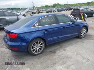 2015 Audi A3 Premium Plus z VIN WAUEFGFF7F1057529, wystawiony jako IAAI lot #42230483 z przebiegiem 110 344 mil mil oraz . Historia ofert i sprzedaży dostępna na DreamBid. Obrazek 4.