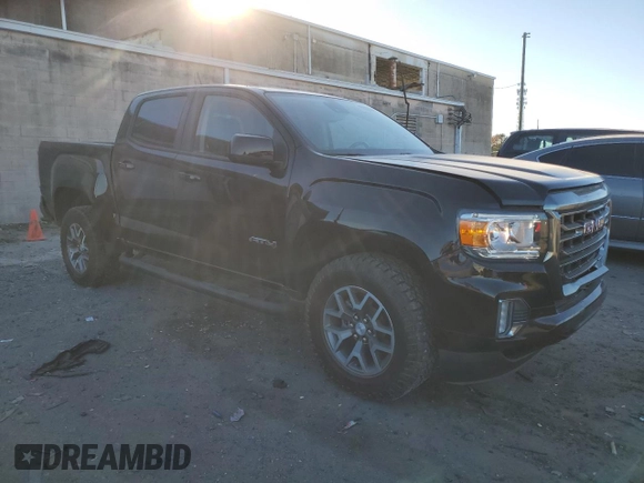 2021 GMC Canyon 4WD AT4 w/Cloth with VIN 1GTG6FEN5M1100096, listed as a Copart auction lot 77535584 with 25,152 mi miles and Salvage Title. Bid and sale history available at carsss.com. Image 4.