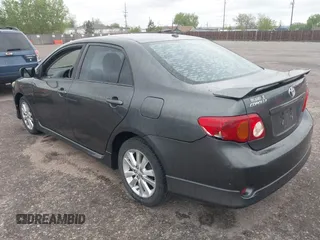 2009 Toyota Corolla with VIN 1NXBU40E99Z050218, listed as a IAAI auction lot 42208256 with 149,796 mi miles. Bid and sale history available at carsss.com. Image 3.