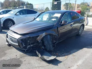 2014 Infiniti Q50 with VIN JN1BV7AP8EM670333, listed as a IAAI auction lot 41670015 with 59,427 mi miles. Bid and sale history available at carsss.com. Image 21.