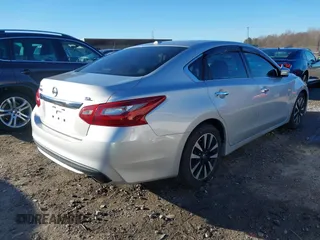 2018 Nissan Altima S with VIN 1N4AL3AP2JC239743, listed as a IAAI auction lot 41683606 with 141,354 mi miles and . Bid and sale history available at DreamBid. Image 4.