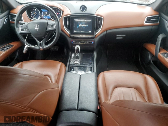 2017 Maserati Ghibli S Q4 z VIN ZAM57RTA4H1248389, wystawiony jako Copart lot #85218514 z przebiegiem 68 272 mil mil oraz Szkody całkowita. Historia ofert i sprzedaży dostępna na DreamBid. Obrazek 8.