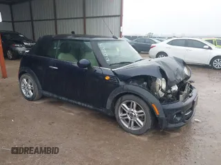 2013 MINI Convertible with VIN WMWZN3C53DT135492, listed as a IAAI auction lot 41436703 with 79,408 mi miles and . Bid and sale history available at DreamBid. Image 1.