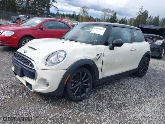 2016 MINI Cooper Hardtop S with VIN WMWXP7C59G2A42935, listed as a IAAI auction lot 41910245 with 106,154 mi miles. Bid and sale history available at carsss.com. Image 2.