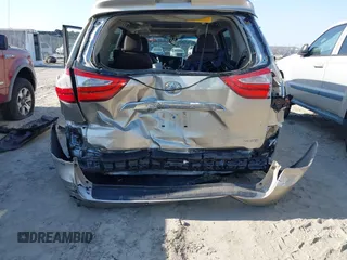 2015 Toyota Sienna XLE with VIN 5TDYK3DC0FS632909, listed as a IAAI auction lot 42012143 with 97,084 mi miles and . Bid and sale history available at DreamBid. Image 6.