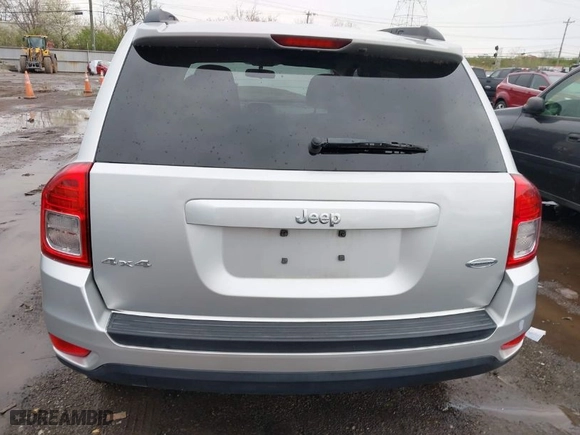 2011 Jeep Compass with VIN 1J4NF1FB6BD283741, listed as a IAAI auction lot 41948515 with 105,415 mi miles. Bid and sale history available at carsss.com. Image 6.