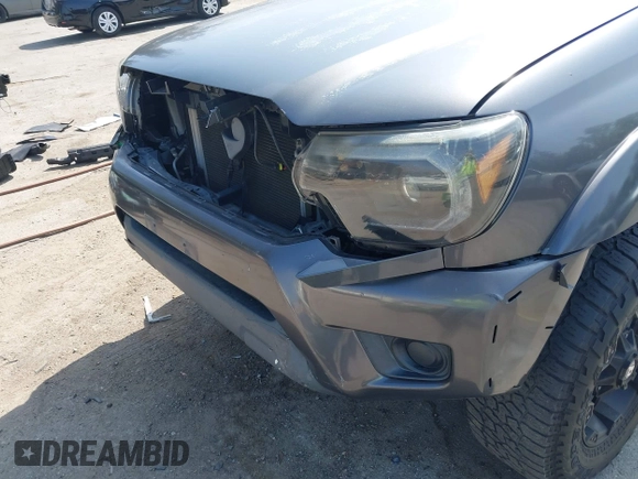 2013 Toyota Tacoma PreRunner z VIN 5TFJX4GN2DX018800, wystawiony jako IAAI lot #42304447 z przebiegiem 188 409 mil mil oraz . Historia ofert i sprzedaży dostępna na DreamBid. Obrazek 20.