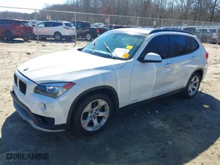 2015 BMW X1 sDrive28i with VIN WBAVM1C53FV317173, listed as a IAAI auction lot 41586385 with 146,068 mi miles. Bid and sale history available at carsss.com. Image 17.