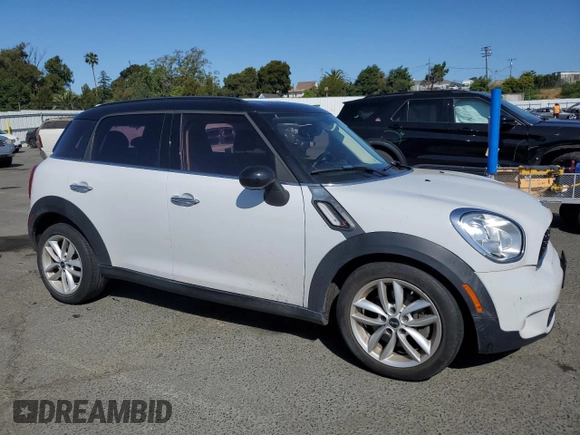 2014 MINI Countryman S with VIN WMWZC3C5XEWP25792, listed as a Copart auction lot 58583455 with 83,831 mi miles and Salvage title. Bid and sale history available at DreamBid. Image 4.