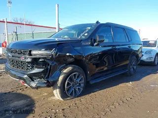 2021 Chevrolet Tahoe Z71 with VIN 1GNSKPKD1MR460353, listed as a IAAI auction lot 41427602 with 56,635 mi miles. Bid and sale history available at carsss.com. Image 6.