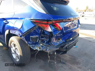 2024 Hyundai Tucson SEL with VIN 5NMJBCDE4RH334082, listed as a IAAI auction lot 41493611 with 10,441 mi miles and . Bid and sale history available at carsss.com. Image 6.