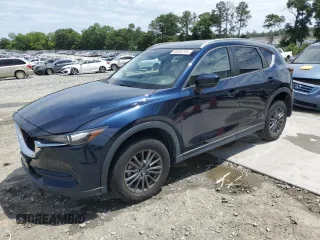 2020 Mazda CX-5 Touring z VIN JM3KFACM7L1831643, wystawiony jako Copart lot #55668765 z przebiegiem 21 535 mil mil oraz Szkoda całkowita • Salvage title. Historia ofert i sprzedaży dostępna na DreamBid. Obrazek 1.