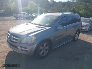 2011 Mercedes-Benz GL-Class GL 450 with VIN 4JGBF7BE8BA671420, listed as a IAAI auction lot 42064096 with 182,622 mi miles. Bid and sale history available at carsss.com. Image 2.