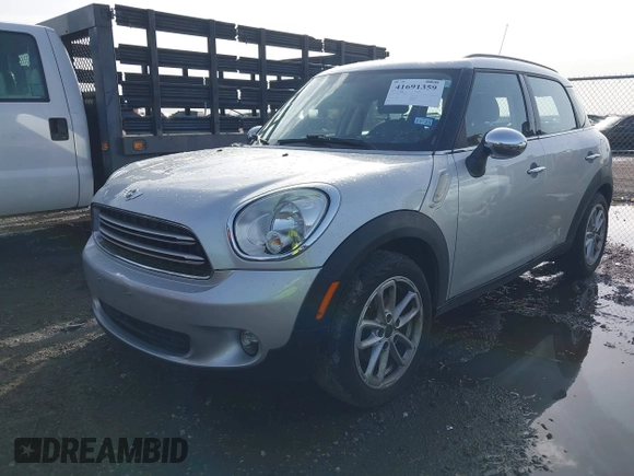 2015 MINI Countryman with VIN WMWZB3C56FWR46360, listed as a IAAI auction lot 41691359 with 88,305 mi miles and . Bid and sale history available at DreamBid. Image 2.