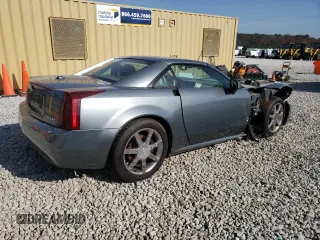 2004 Cadillac XLR z VIN 1G6YV34A845603654, wystawiony jako Copart lot #83494824 z przebiegiem 89 609 mil mil oraz Szkoda całkowita • Salvage title. Historia ofert i sprzedaży dostępna na DreamBid. Obrazek 3.