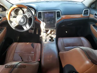 2013 Jeep Grand Cherokee Overland with VIN 1C4RJFCT8DC523252, listed as a Copart auction lot 48706965 with 173,325 mi miles and Salvage Title. Bid and sale history available at carsss.com. Image 8.