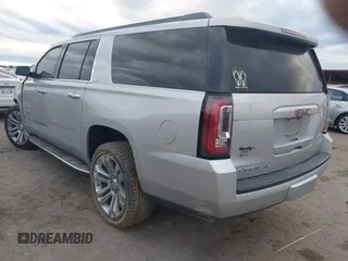 2019 GMC Yukon XL SLT with VIN 1GKS1GKC8KR383694, listed as a IAAI auction lot 41466213 with 128,368 mi miles. Bid and sale history available at carsss.com. Image 3.