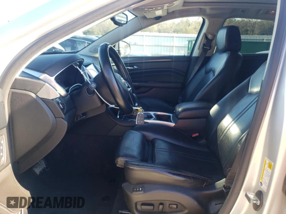 2016 Cadillac SRX Premium Collection with VIN 3GYFNDE39GS566659, listed as a Copart auction lot 87093314 with 91,411 mi miles and Salvage title. Bid and sale history available at DreamBid. Image 7.