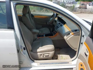 2005 Toyota Avalon XL with VIN 4T1BK36B65U045629, listed as a IAAI auction lot 42093132 with 133,157 mi miles. Bid and sale history available at carsss.com. Image 5.