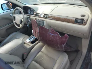 2005 Ford Five Hundred Limited с VIN 1FAFP28195G127980, выставлен на аукционе Copart как лот 53612605 с пробегом Не указан миль и Списание • Salvage title. История ставок и продаж доступна на DreamBid. Изображение 8.